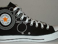 Converse Century Print High Top Chucks  Inside patch view of a left black, white, and orange century print high top.