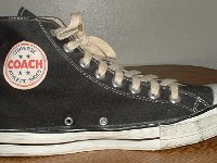 Converse Vintage Shoes  Inside patch view of a left Converse Coach black high top.