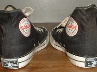 Converse Vintage Shoes  Angled rear view of Converse Coach black high tops.