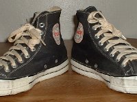 Converse Vintage Shoes  Angled inside patch views of Converse Coach black high tops.