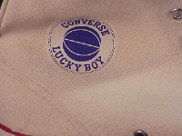 Converse Vintage Shoes  Closeup of the lucky boy patch.