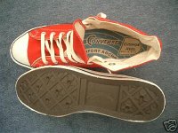 Converse Vintage Shoes  Top and outer sole view of red coach high tops.