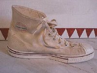 Converse Vintage Shoes  Inside patch view of  a left white canvas high top.