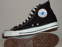 Core Black High Top Chucks  Inside patch and sole views of black high top chucks.
