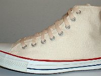 Core Natural (Unbleached) White High Top Chucks  Outside view of a left natural white high top.