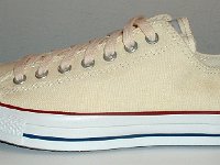 Core Natural (Unbleached) White Low Cut Chucks  Outside view of a left natural white low cut.