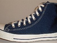 Core Navy Blue High Top Chucks  Outside view of a left navy blue high top.