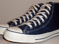 Core Navy Blue High Top Chucks  Angled side view of navy blue high tops.