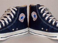 Core Navy Blue High Top Chucks  Angled front view of navy blue high tops.