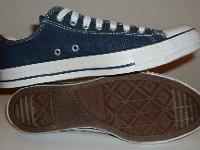 Core Navy Blue Low Cut Chucks  Insie and sole views of navy blue low cut chucks.