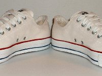 Core Optical White Low Cut Chucks  Angled front view of optical white low cut chucks.