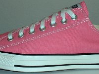 Core Pink Low Cut Chucks  Outside view of a left pink low cut.
