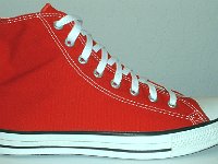 Core Red High Top Chucks  Outside view of a right red high top.