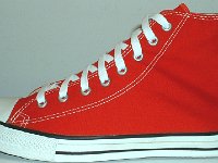 Core Red High Top Chucks  Outside view of a left red high top.