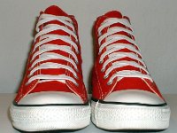 Core Red High Top Chucks  Front view of red high tops.