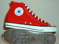 Core Red High Top Chucks  Inside patch and sole view of red high tops.