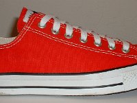 Core Red Low Cut Chucks  Outside view of a right red low cut chuck.