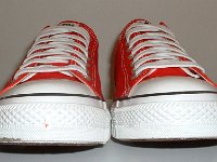 Core Red Low Cut Chucks  Front view of red low cut chucks.