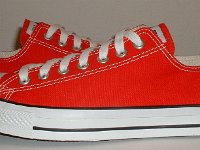 Core Red Low Cut Chucks  Outside views of red low cut chucks.