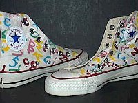 Chucks With Custom Print Pattern Uppers  New alphabet pattern high tops, angled side views.