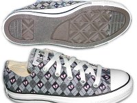 Chucks With Custom Print Pattern Uppers  Side and sole views of broken hearts pattern low cuts.