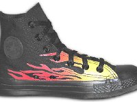 Chucks With Custom Print Pattern Uppers  Inside patch view of a left monochrome black flames high top.