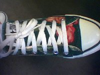 Chucks With Custom Print Pattern Uppers  Top view of a left floral print low cut.