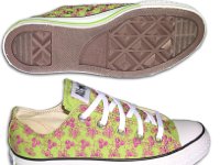 Chucks With Custom Print Pattern Uppers  Side and sole view of stitched flower pattern low cuts.