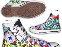 Chucks With Custom Print Pattern Uppers  Side and sole views of black graffiti high tops.