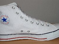 Chucks With Custom Print Pattern Uppers  Inside patch view of a left white graffiti high top.