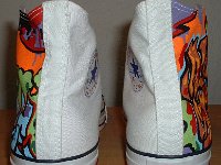 Chucks With Custom Print Pattern Uppers  Rear view of white graffiti high tops.