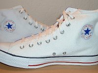 Chucks With Custom Print Pattern Uppers  Inside patch views of white graffiti high tops.