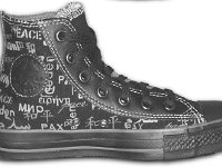 Chucks With Custom Print Pattern Uppers  Inside patch view of a left John Lennon peace high top.