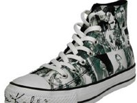 Chucks With Custom Print Pattern Uppers  Angled side of a left Frida Kahlo print high top.