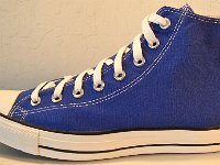 Dazzling Blue High Top Chucks  Outside view of a left dazzling blue high top chuck.