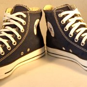 Deep Blue High Top Chucks  Angled front view of deep blue high tops.