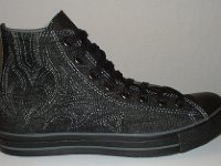 Denim Chuck Taylors  Outside view of a right black charcoal stitched denim high top chuck.