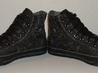 Denim Chuck Taylors  Angled front view of black charcoal stitched denim high top chucks.