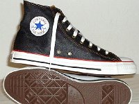 Denim Chuck Taylors  Navy blue coated denim high tops, left inside patch and sole views.