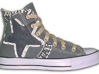 Denim Chuck Taylors  Blue denim graphic star high top, right outside view.