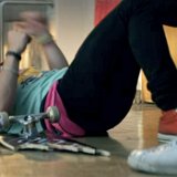 Chucks in the Film Detention  Clapton lying on the floor next to his broken skateboard.