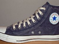 Distressed High Top Chucks  Inside patch view of a right navy blue distressed high top chuck.