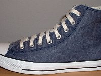 Distressed High Top Chucks  Outside view of a left navy blue distressed high top chuck.