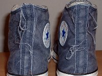 Distressed High Top Chucks  Rear view of navy blue distressed high top chucks.