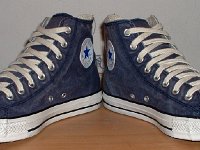 Distressed High Top Chucks  Angled front view of navy blue distressed high top chucks.