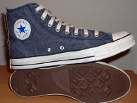 Distressed High Top Chucks  Inside patch and sole views of navy blue distressed high top chucks.