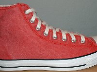 Distressed High Top Chucks  Distressed red right high top, outside view.