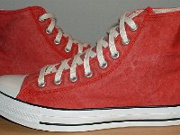 Distressed High Top Chucks  Distressed red high tops, outside views.
