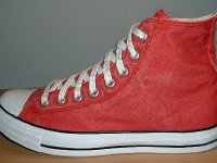 Distressed Red High Top Chucks  Distressed red left high top, outside view.