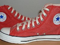 Distressed Red High Top Chucks  Distressed red high tops, inside patch view.